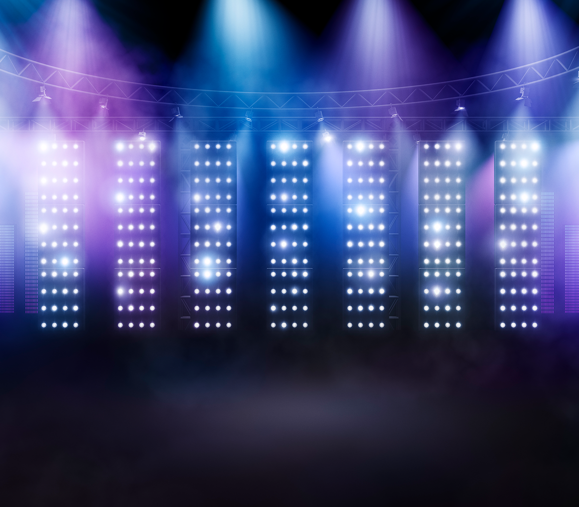 Bright stage lights in a concert setting
