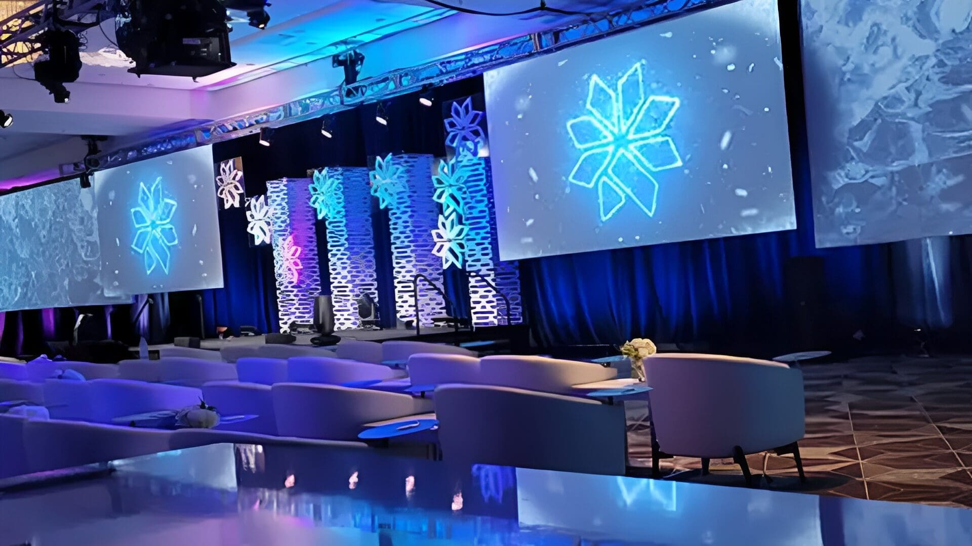 Elegant event space with snowflake-themed decor.
