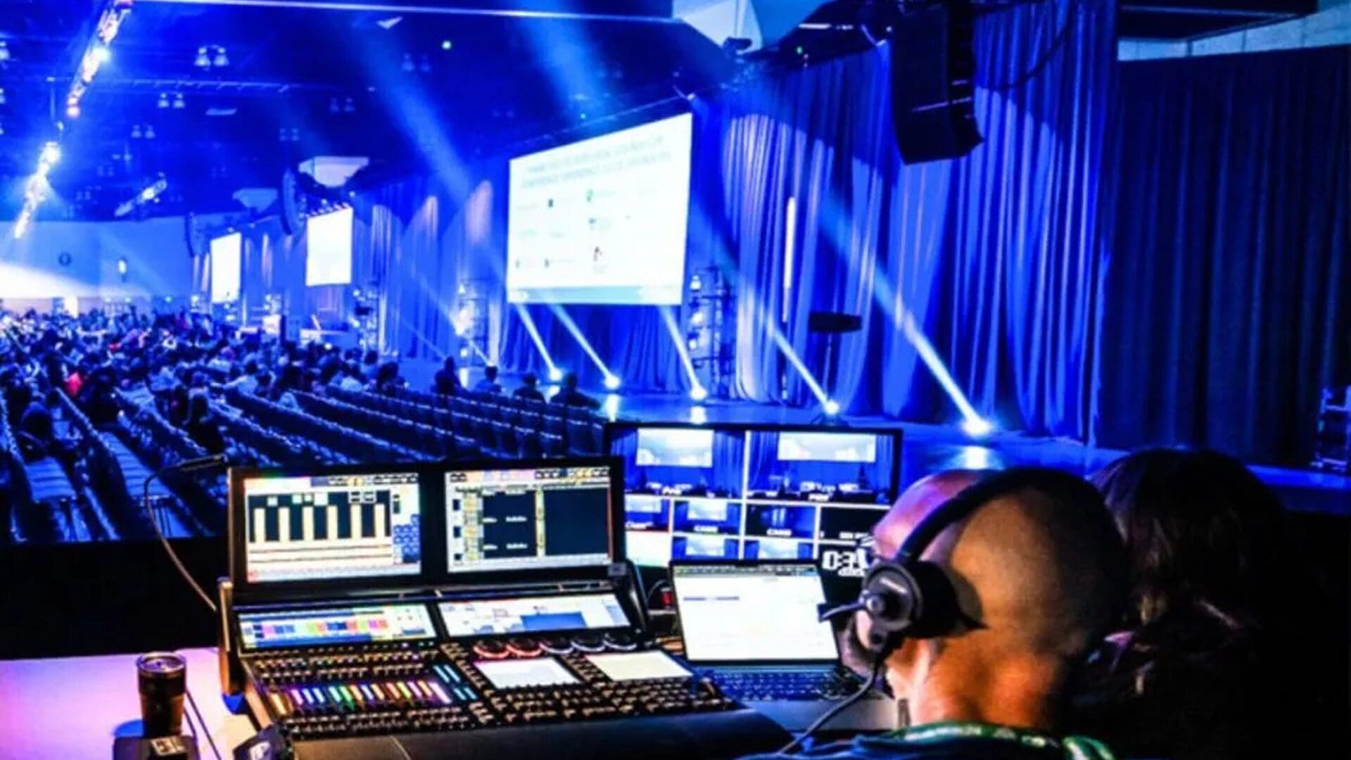 "Control room managing a vibrant event setup."